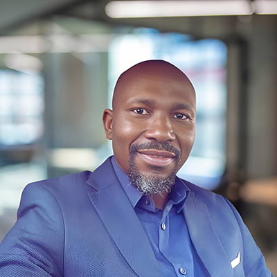 Portrait of Rhodwell Sikazwe, CEO, Hollard Insurance Zambia